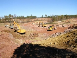 Tractors clearing out an area in preperation for future building