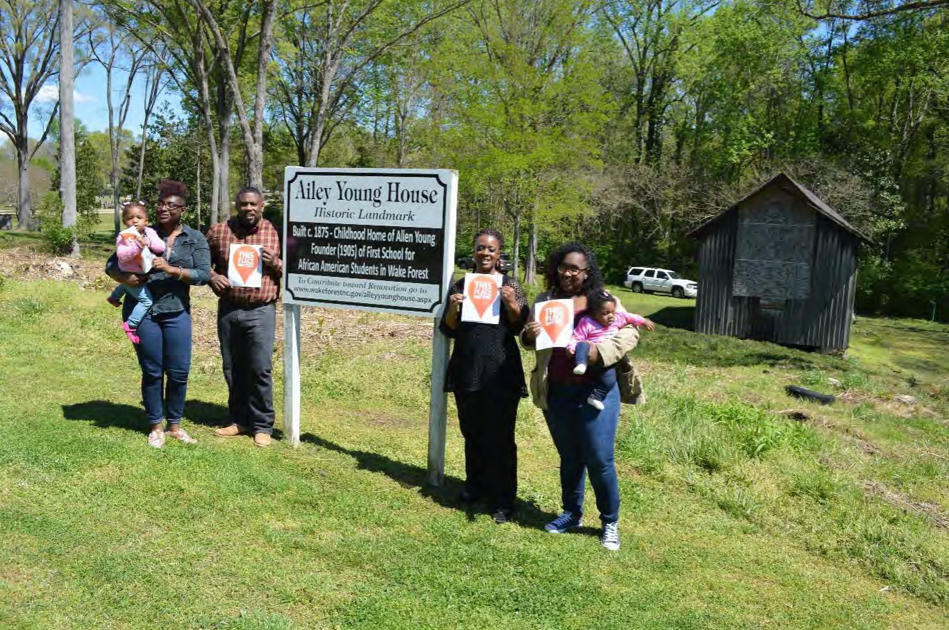 Members of the Young family in front of the circa 1875 Ailey Young House