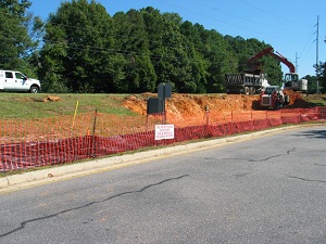 Creating proper slope down to parking lot